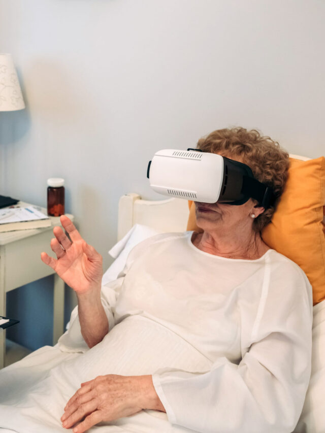 Older patient using virtual reality glasses